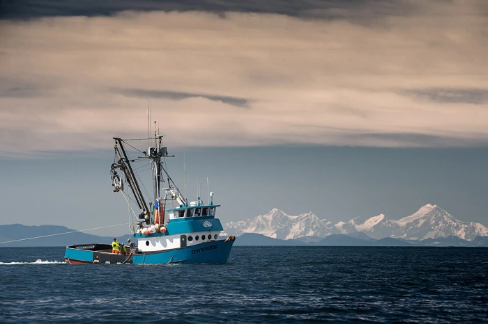 Fishing vessel at work on the water