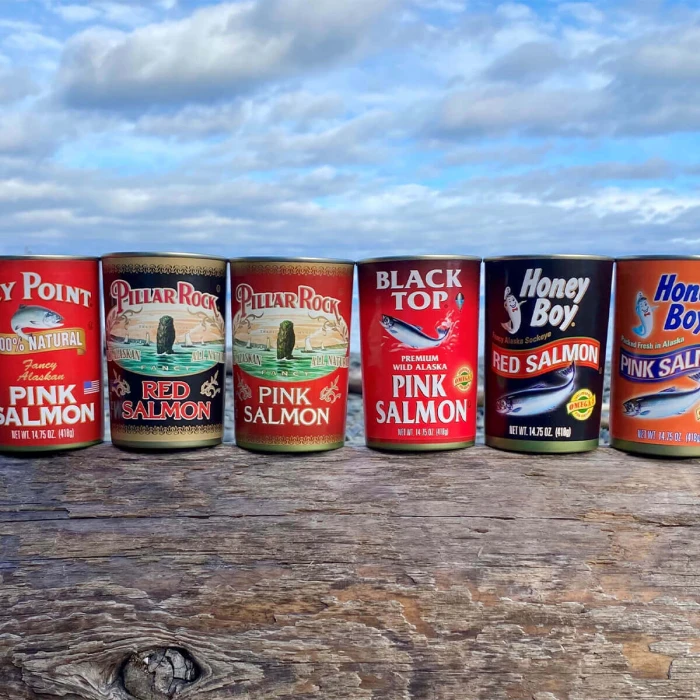 Six canned salmon cans, including pink salmon and red salmon