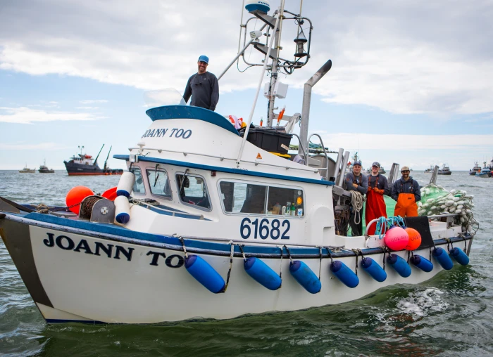 Fishermen working on the boat